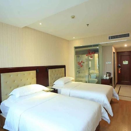 Vienna Hotel In Pinghu Square Шэньчжэнь Экстерьер фото