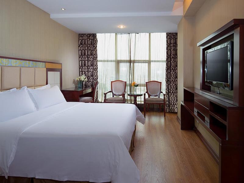 Vienna Hotel In Pinghu Square Шэньчжэнь Экстерьер фото