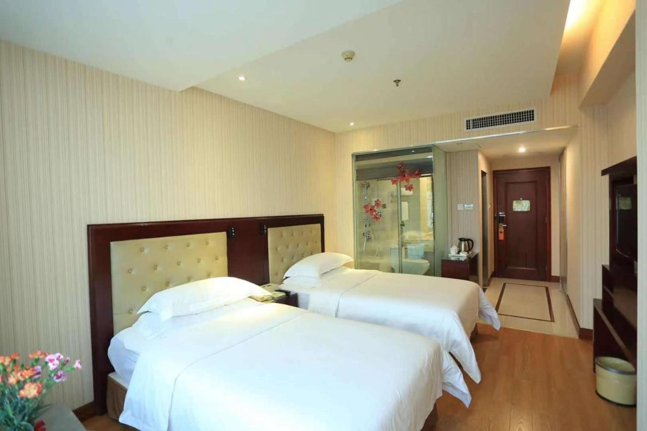 Vienna Hotel In Pinghu Square Шэньчжэнь Экстерьер фото